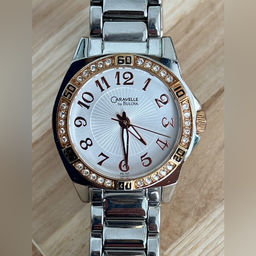 Caravelle by Bulova Ladies Watch Stainless Bracelet White Dial Date Window